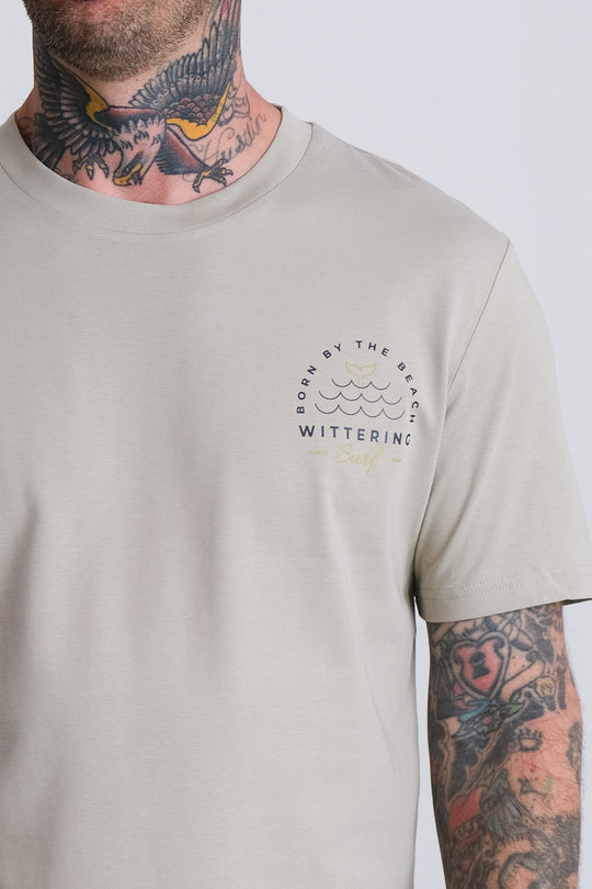 BORN BY THE BEACH -  MENS T-SHIRT - STONE - Black &amp; Gold Design - Wittering Surf Shop